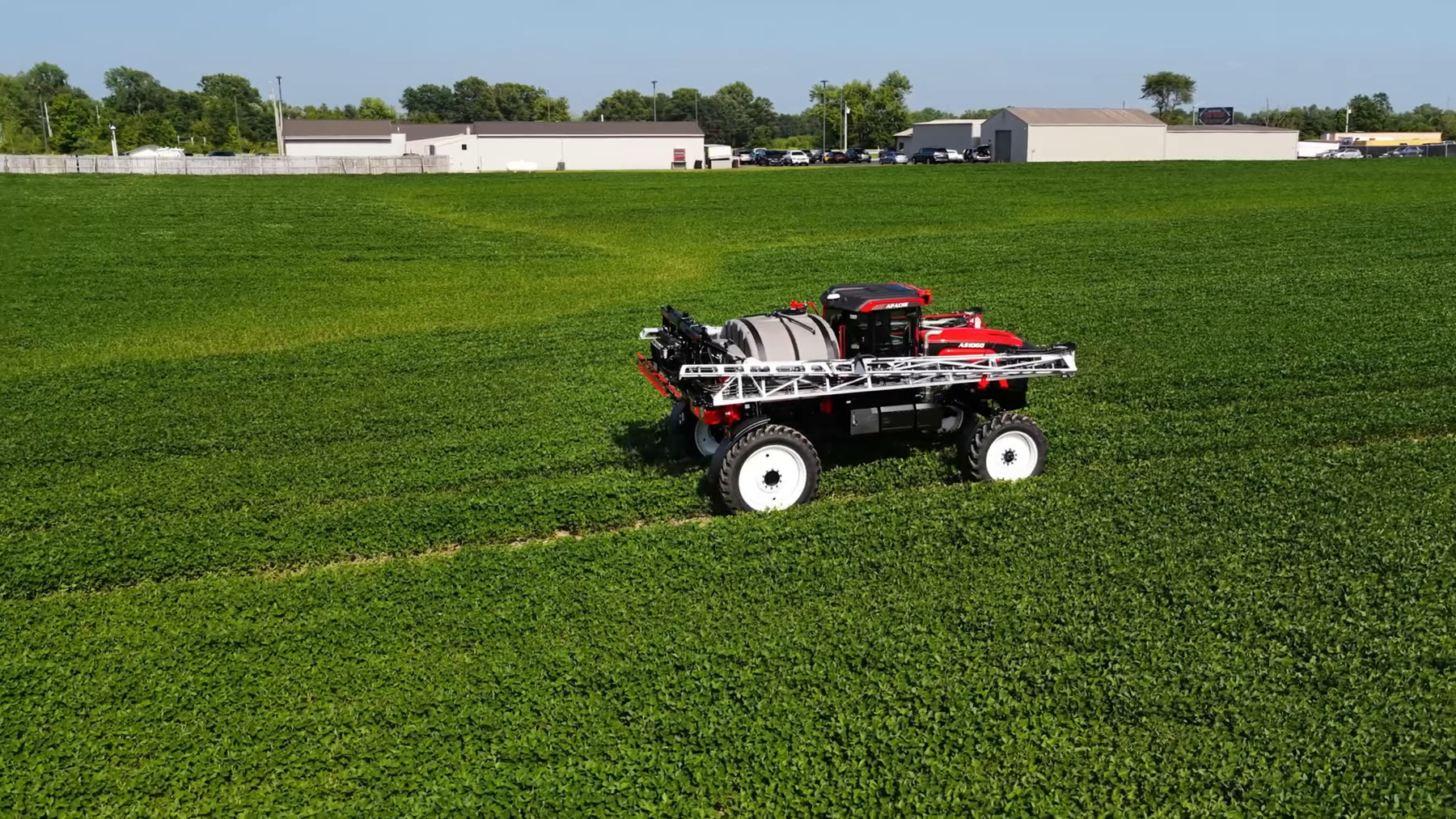 Apache AS1060 riding through a soybean field